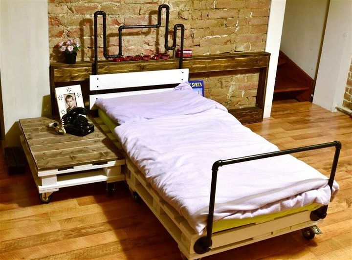 pallet and old metal pipe bed