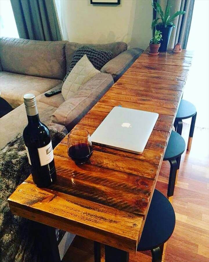pallet behind sofa table and bar table